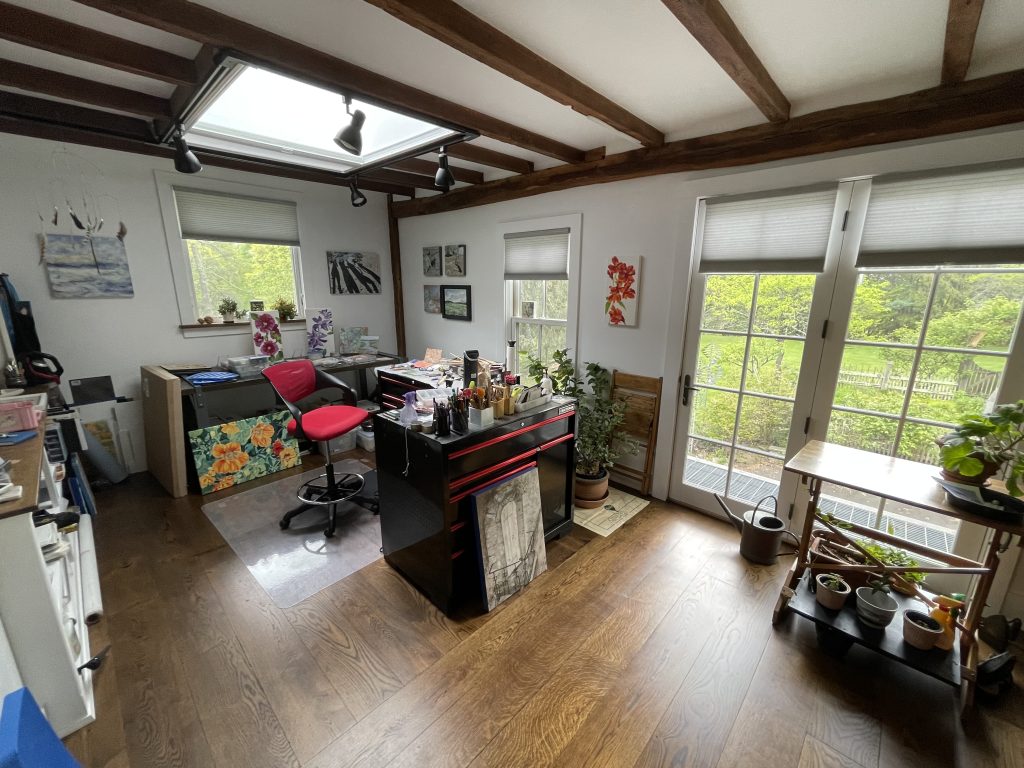 A different view of the studio of Heather Douglas. The garden can be seen from the windows. 